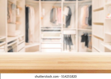 Empty Wooden Table On A Background Blur Closet In The Room  For Display Or Montage Your Products