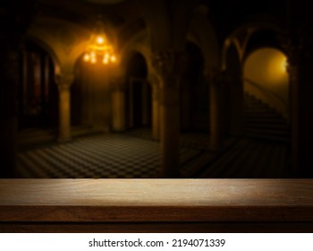 Empty Wooden Table On Mystical Dungeon Of An Ancient Gothic Castle Background. Mock-up In The Style Of A Men's Party, For The Design And Display Of The Product.
