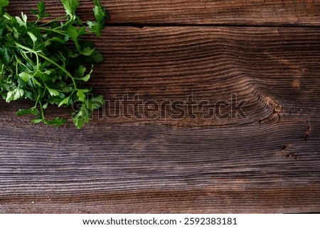 Empty wooden table - empty pine boards with parsley
