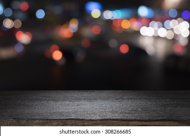 Empty Wooden Table Platform And Bokeh At Night
