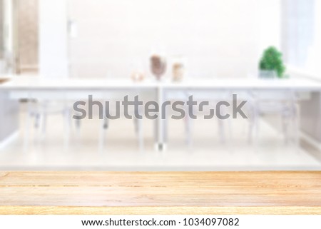 Empty wooden table space platform and blurred resturant background for product display montage