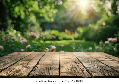 Empty wooden table top with blurred garden background for product display presentation or montage - Powered by Shutterstock