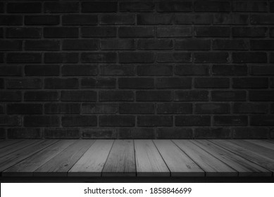 Empty Wooden Table Top On Black Dark Brick Wall Background, Design Wood Counter White. Perspective For Show Space For Your Copy And Branding. Can Be Used As Product Display Montage. Vintage Style.