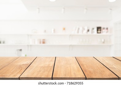 Empty Wooden Table And White Modern Kitchen Cafe Background,resturant. Ready For Product Montage