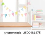 Empty wooden tabletop with blurred decorated window and book shelf background