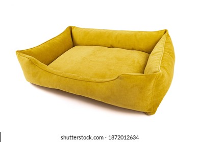 Empty Yellow Dog Bed On A White Background. Angle View.