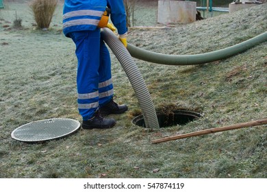 Emptying Household Septic Tank. Cleaning Sludge From Septic System.