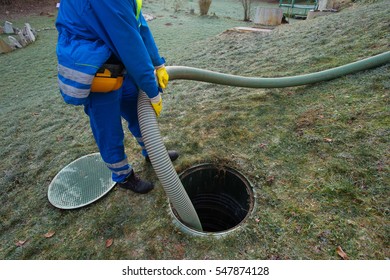 Emptying Household Septic Tank. Cleaning Sludge From Septic System.