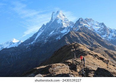 En route to Mardi Base Camp, behold the elegance of Mount Machapuchare (Fishtail) and Mardi Himal, offering a captivating and awe-inspiring vista of these iconic peaks in the Himalayas.