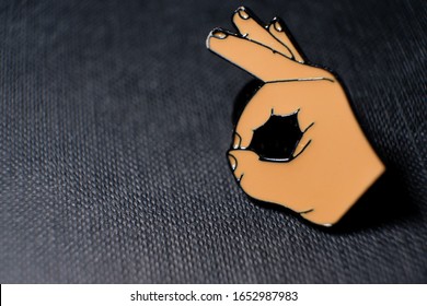 Enamel Lapel Pin Badge OK Hand Sign Symbol On Black Textured Background