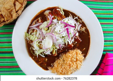 Enchiladas Of Mole And Rice Mexican Food Colorful Tablecloth