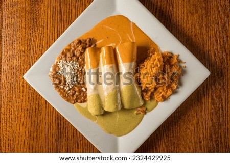 Enchiladas with rice and beans