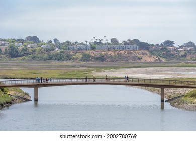 Encinitas, CA USA - July 5th 2021 : Visitors on the bridge at the San Elijo Lagoon.