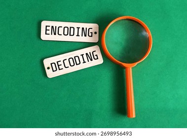 Encoding and decoding words on square wooden pieces with magnifying glass