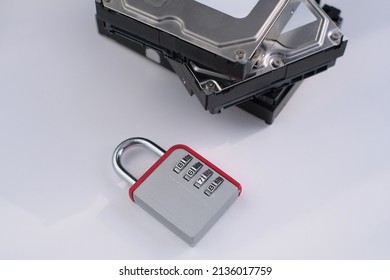 Encrypted hard disk. Padlock with cipher on an opened hard disk. Data loss. computer motherboard. the concept of data, hardware, information technology and cyber security.