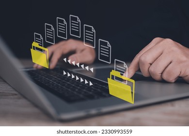 Encryption with file transfer concept : Business man use laptop  for remote and download or upload folder document picture by internet connection with full access to remote files.