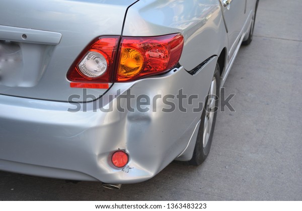 the end of the car that is dented and broken\
from accident