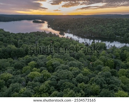 End of day light drone view of crown land in summer