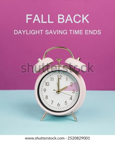 End of daylight saving time in fall, winter time changeover, alarm clock, autumn season 