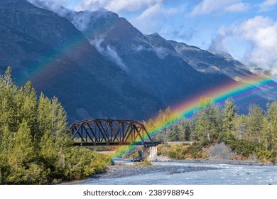 The end (or beginning) of a double rainbow on an Alaska Railroad bridge over the Placer River near Spencer Glacier in Chugach National Forest, Alaska.