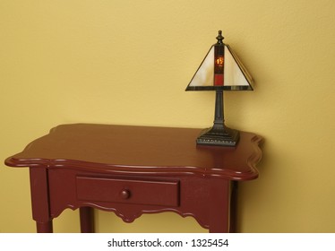 End table and a small lamp