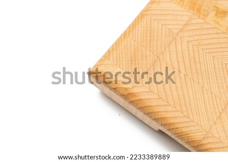 Endgrain wooden cutting board isolated above white background.