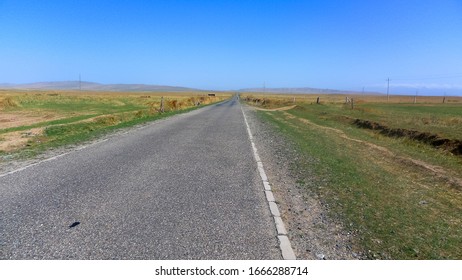 Endless Prairie Road. Gonghe County, Hainan Tibetan Autonomous Prefecture, Qinghai, CHINA