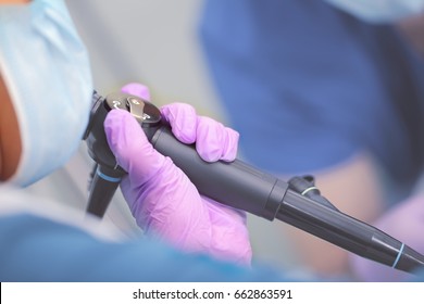 Endoscope in doctor`s hand during medical test.