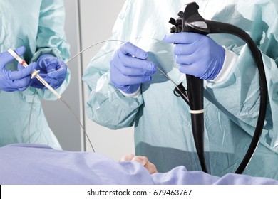 Endoscopy. Doctor holding endoscope before gastroscopy