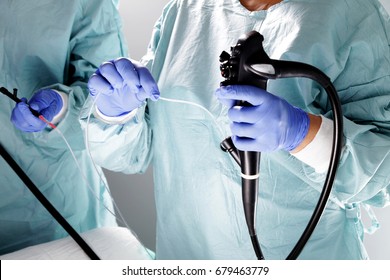 Endoscopy. Doctor holding endoscope before gastroscopy