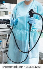 Endoscopy  Doctor Holding Endoscope Head Unit With Tube Before Performing A Diagnosis. 