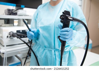 Endoscopy  Doctor Holding Endoscope Head Unit With Tube Before Performing A Diagnosis. 