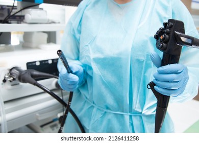 Endoscopy  Doctor Holding Endoscope Head Unit With Tube Before Performing A Diagnosis. 