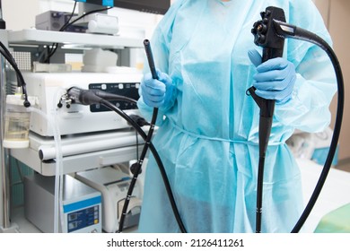 Endoscopy  Doctor Holding Endoscope Head Unit With Tube Before Performing A Diagnosis. 