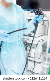 Endoscopy  Doctor Holding Endoscope Head Unit With Tube Before Performing A Diagnosis. 