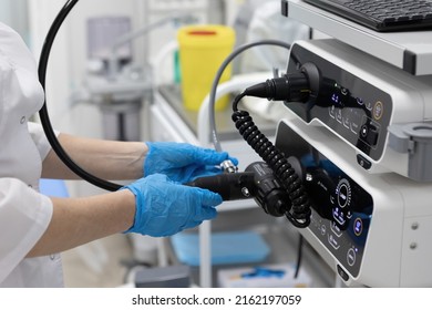 Endoscopy in the hospital. The doctor connects the endoscope before gastroscopy. Medical examination