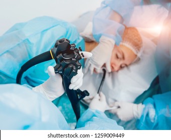 Endoscopy at the hospital. Doctor holding endoscope before gastroscopy. Medical examination