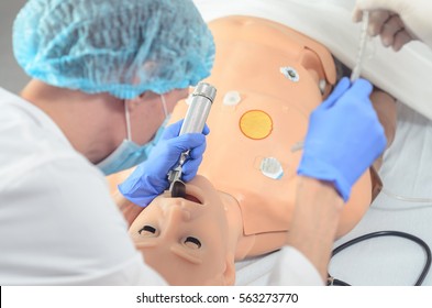 Endotracheal intubation of a reanimation training doll
