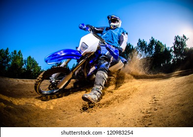 Enduro bike rider on action. Turn on sand terrain. - Powered by Shutterstock