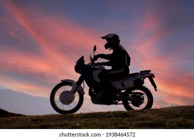 Enduro Motorcycle Travel Adventure On The Hill Off Road, Motorcyclist Gear, Danger Road In Mountains Clouds, Rider, Motocross, Dark