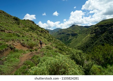 Enduro Mountain Bike Rider Descending To The Bottom Of God Help Me Pass In The Kingdom Of Lesotho.