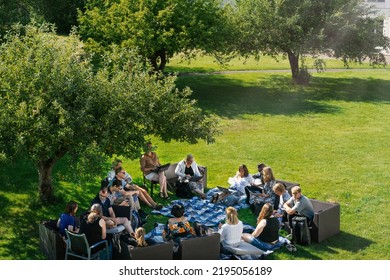 Eneby, Sweden- August 12. 2022 - Team Working Outdoors , Green Office Concept. Collaboration Concept.