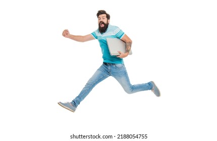 Energetic blogger midair isolated on white. Happy blogger jumping with laptop. Bearded man blogger