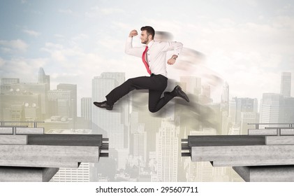 Energetic Business Man Jumping Over A Bridge With Gap Concept