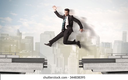 Energetic Business Man Jumping Over A Bridge With Gap Concept