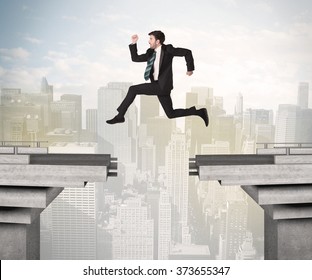 Energetic Business Man Jumping Over A Bridge With Gap Concept