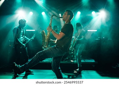 Energetic saxophonist playing saxophone with passion and skill, accompanied by band members on guitar and other instruments, creating vibrant music performance on illuminated stage - Powered by Shutterstock