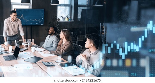 Energetic team leader stands addressing his attentive colleagues during a collaborative meeting in a modern workspace, with digital stock market data overlay, panorama. Work, business - Powered by Shutterstock