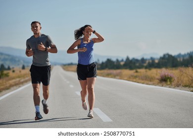 Energized by the beauty of nature, a couple powers through their morning run, their bodies and spirits invigorated. - Powered by Shutterstock