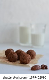 Energy Balls. Homemade Raw Energy Balls With Figs, Carob And Decorated Cocoa On White Background. Suger Free Candies And Vegetarian Truffles.